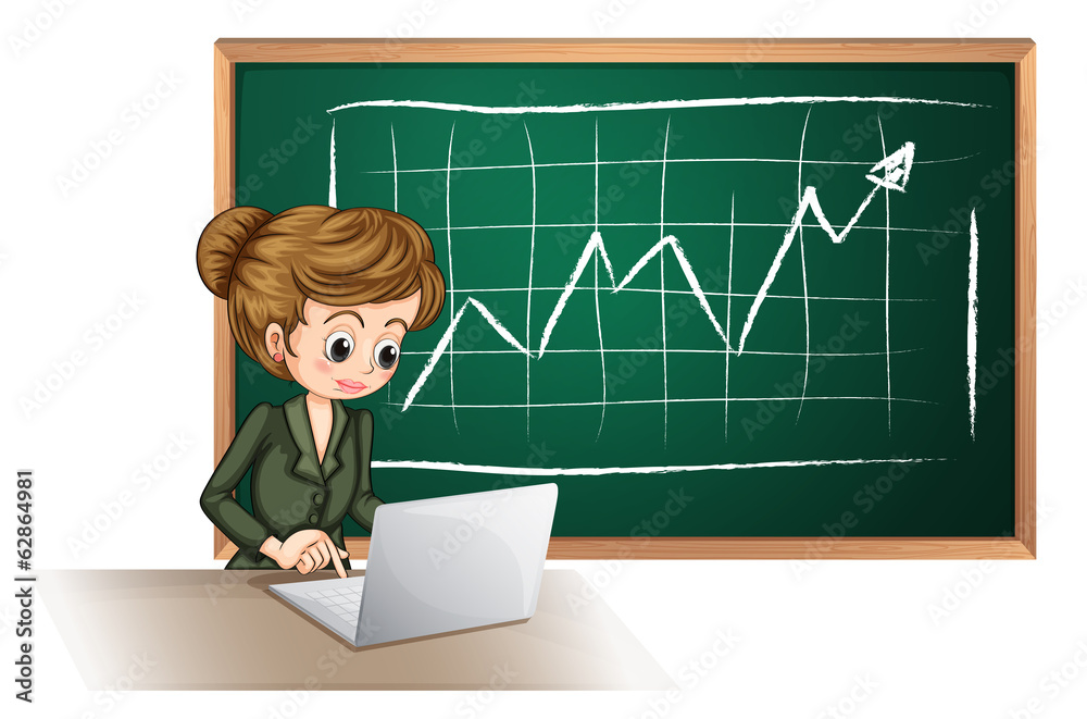 A busy lady using the laptop in front of the blackboard A busy lady using the laptop in front of the blackboard