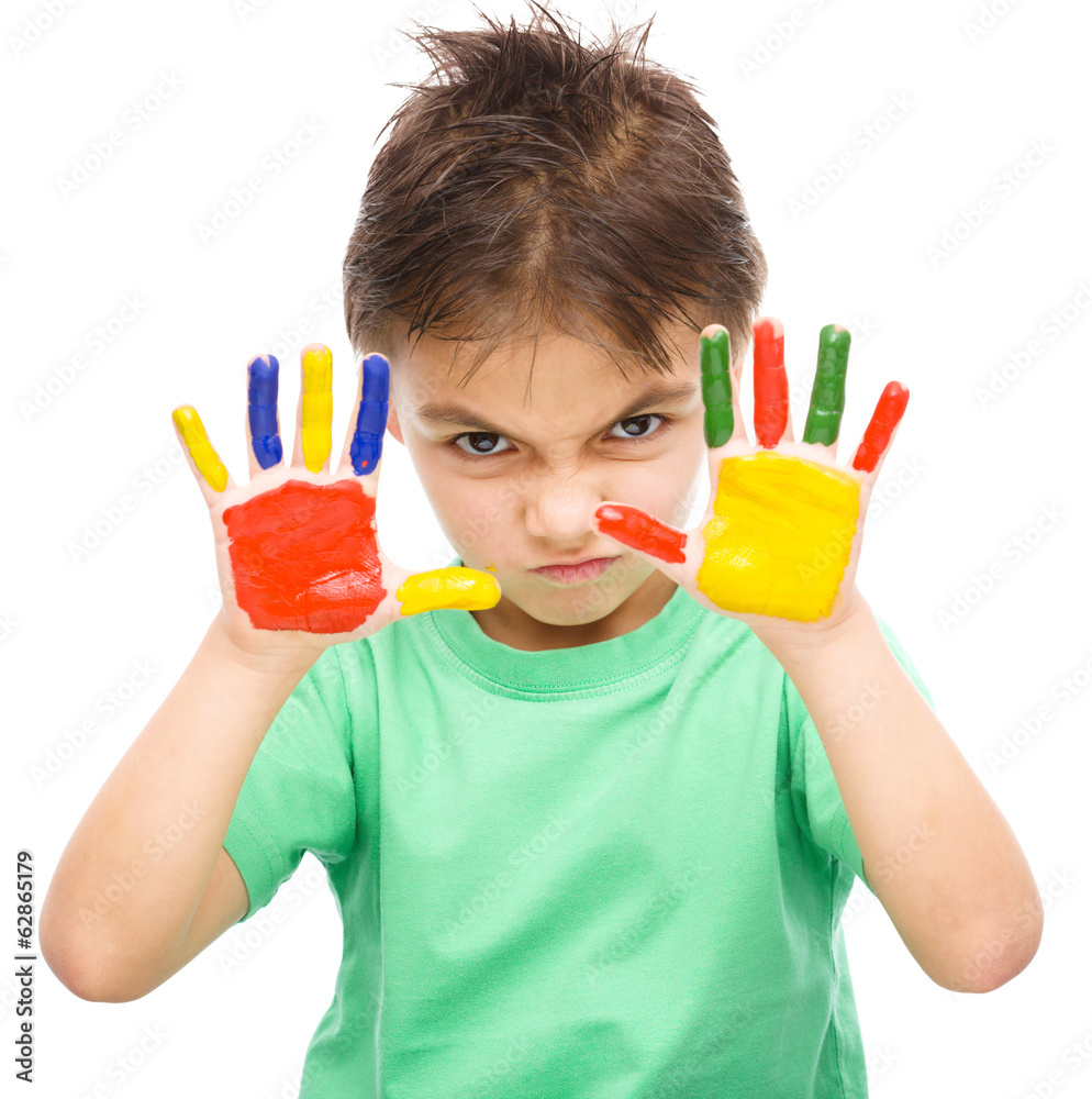 Portrait of a cute boy playing with paints Portrait of a cute boy playing with paints