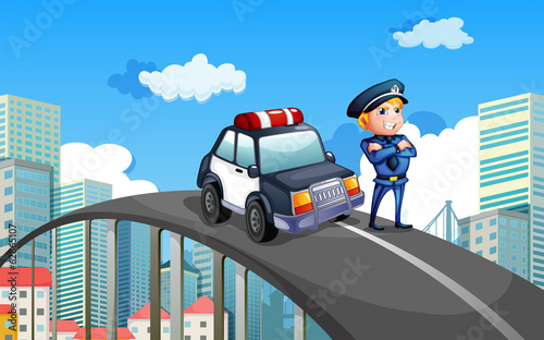A patrol car and a policeman in the middle of the highway