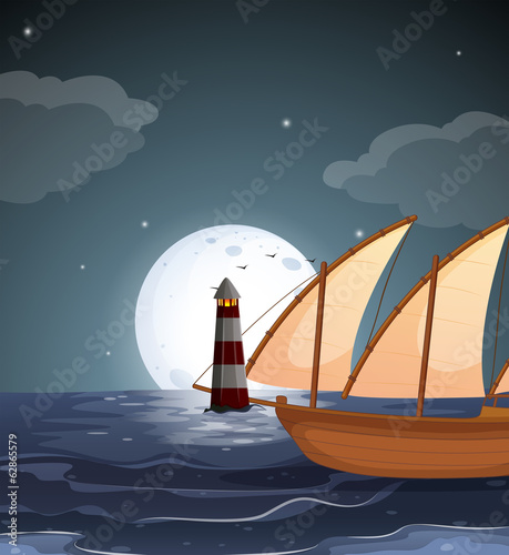 A sea with a lighthouse and a boat