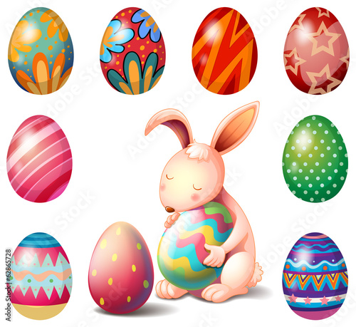 A bunny surrounded with Easter eggs