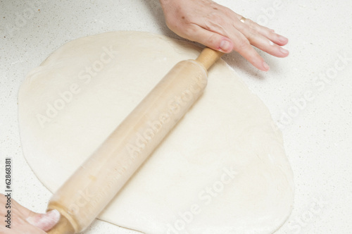 Obraz w ramie kneading dough for bread