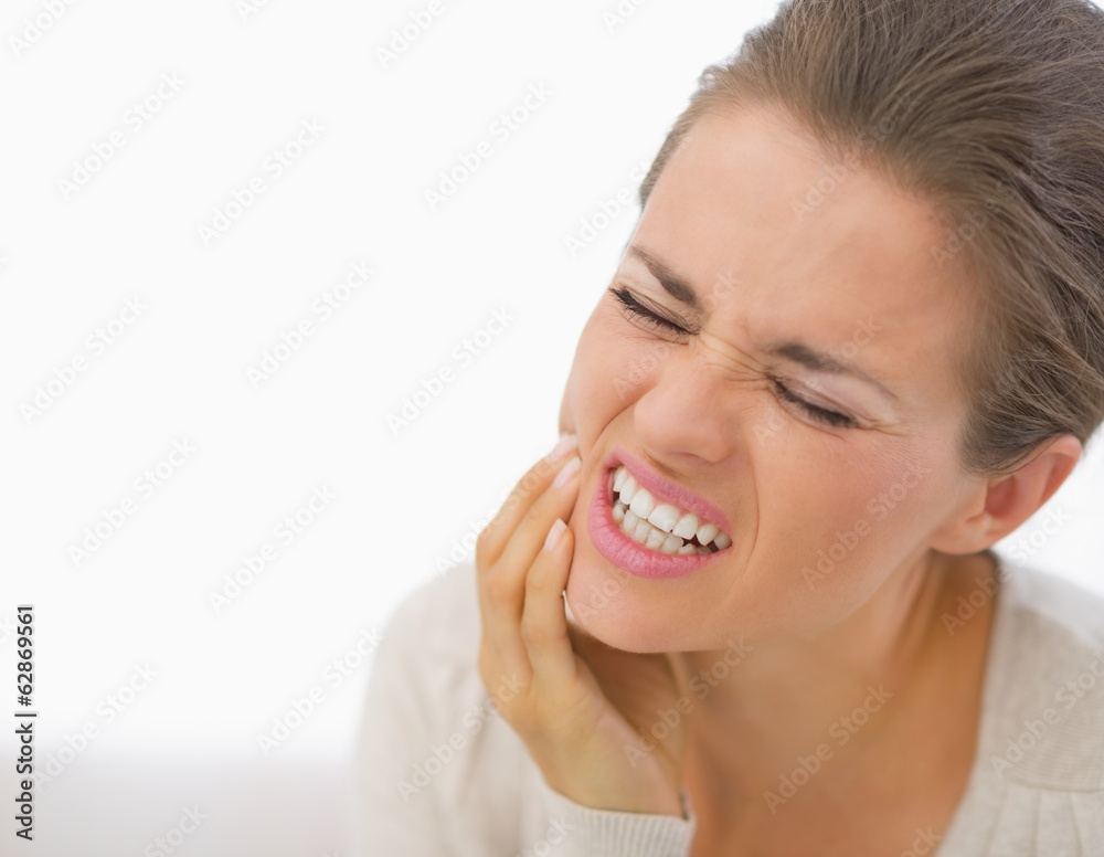 Portrait of young woman with toothache Portrait of young woman with toothache