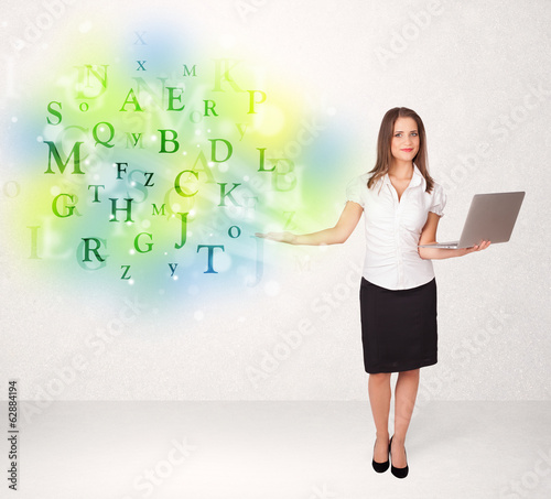 Business women with glowing letter concept