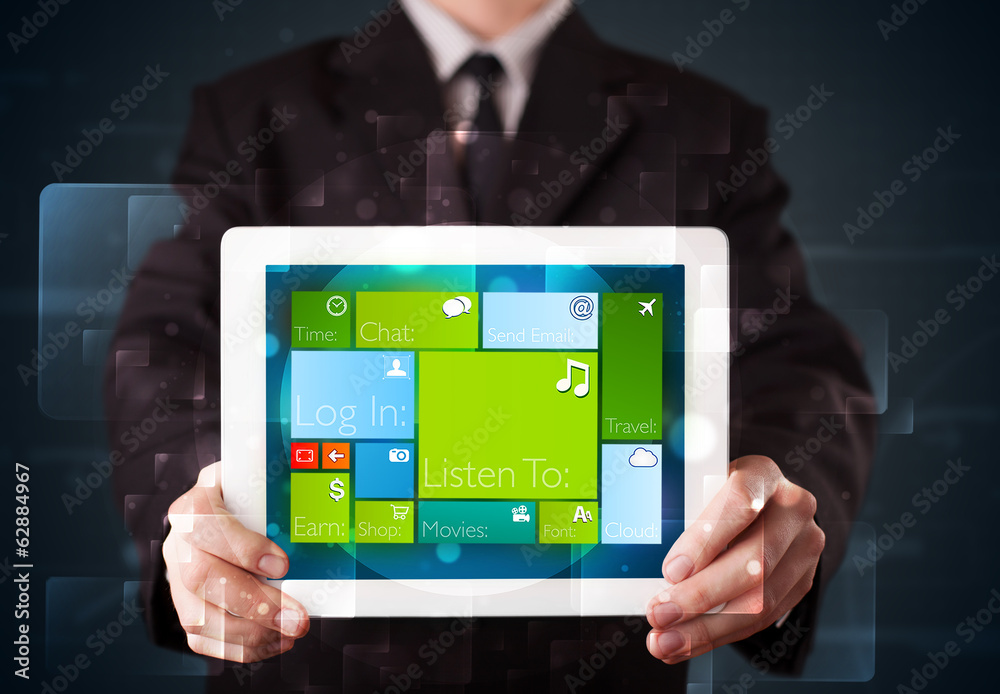 Businessman holding a tablet with modern software operational sy Businessman holding a tablet with modern software operational sy