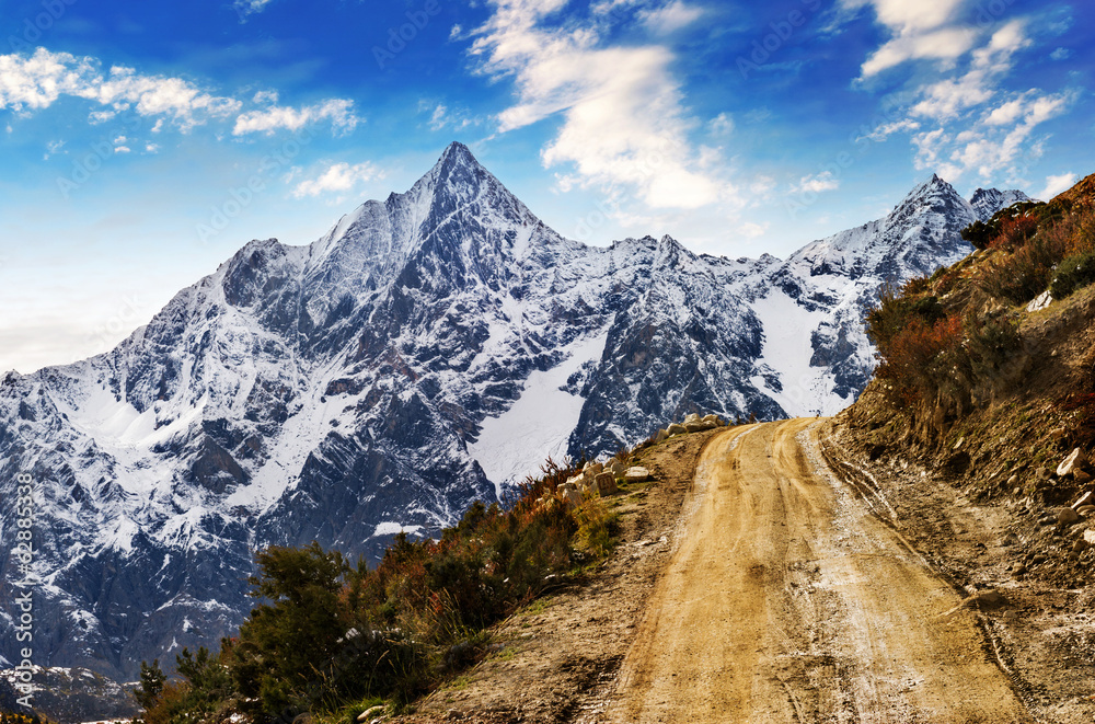 road in the snow mountains