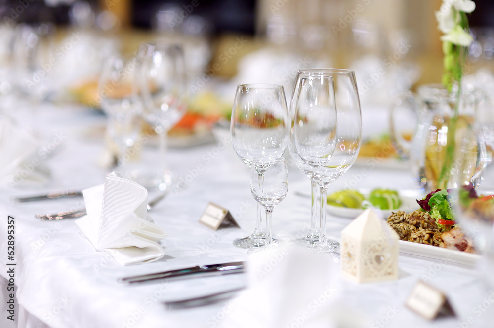 Table set for an event party or wedding reception Table set for an event party or wedding reception