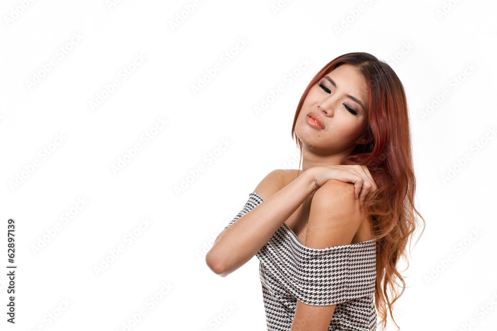 woman with pain at shoulder, neck, upper back injury