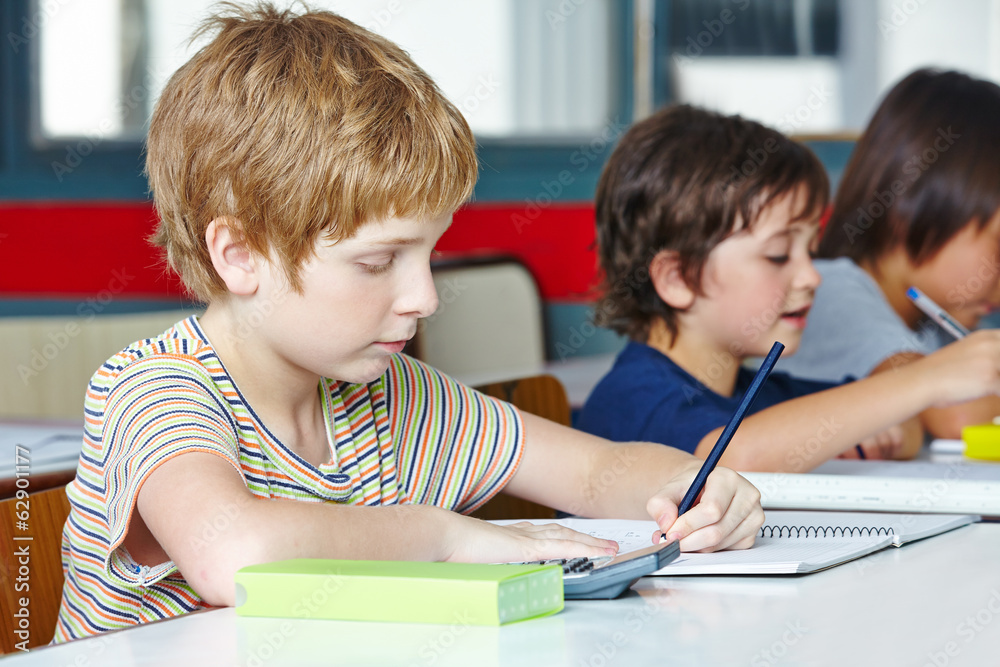 Lefthanded boy in elementary school Lefthanded boy in elementary school