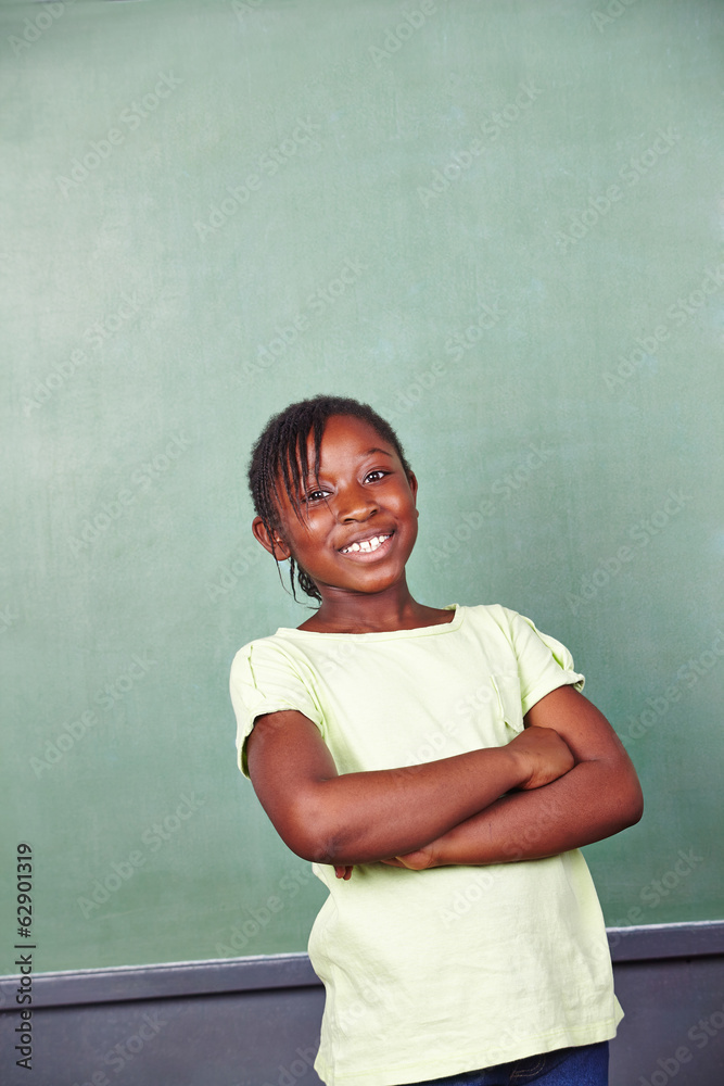 Smiling african girl in school