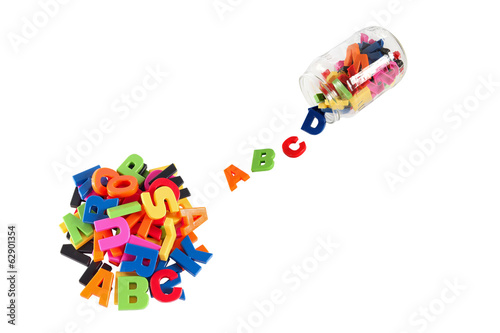Foto Alphabet written in multicolored plastic kids letters and colorf