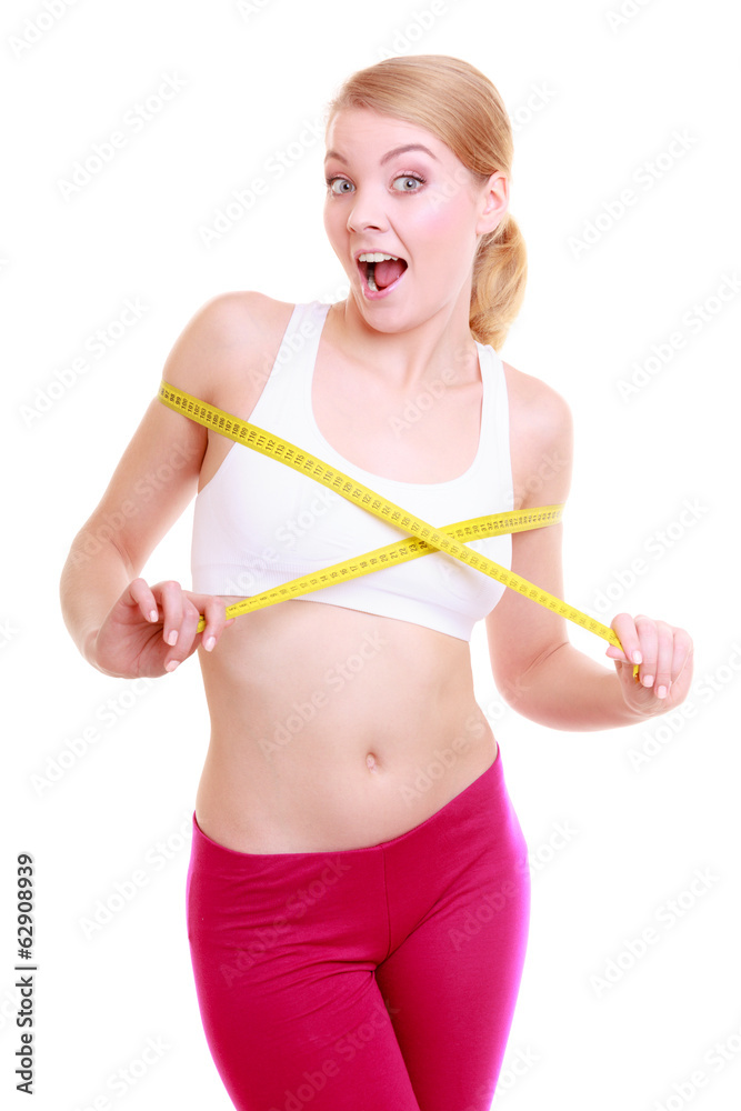 Fitness woman fit girl with measure tape measuring her bust Fitness woman fit girl with measure tape measuring her bust