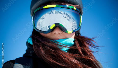 Woman on summit in alps photo