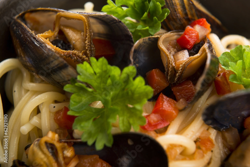 Clams in tomato sauce photo