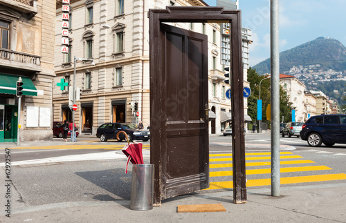 old door opened in the city, surreal scene