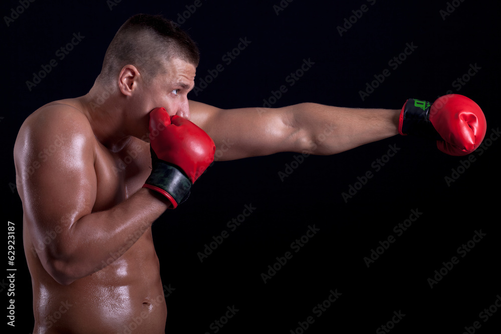 muscular boxer with red gloves