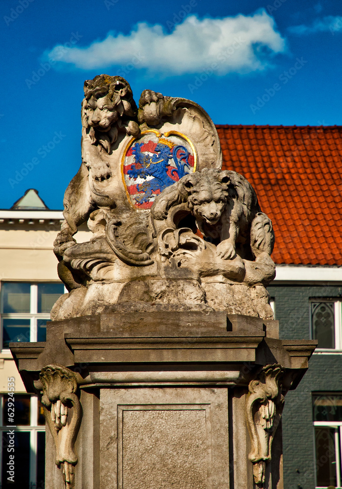 Historical sculpture with lion and bear in Bruges