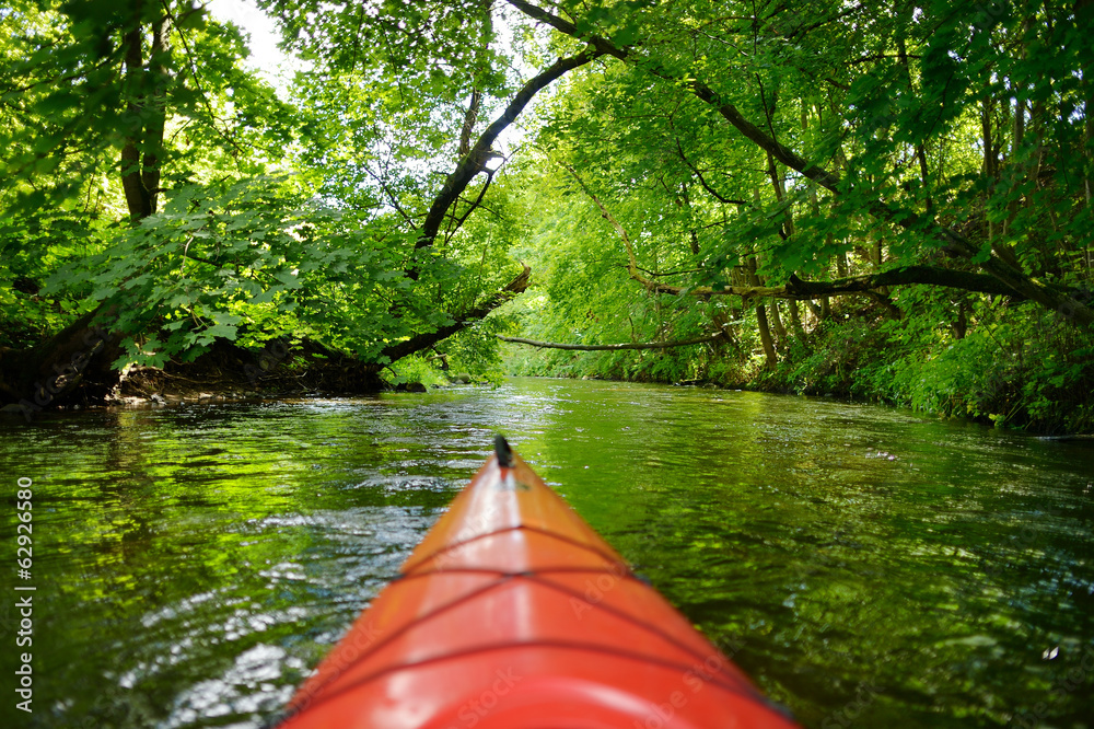 Kayak paddling on river