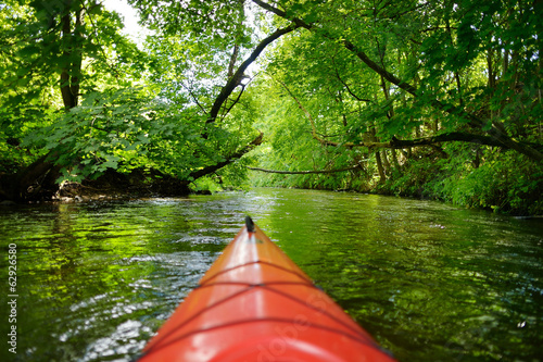 Vászonkép Kayak paddling on river