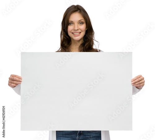 Half-length portrait of smiley girl keeping copyspace