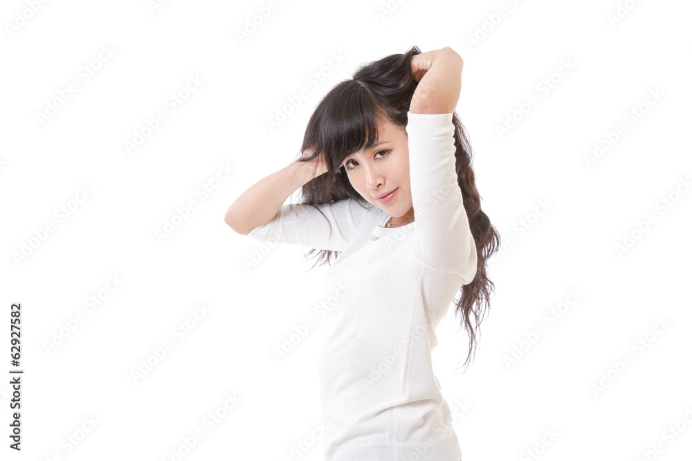 Chinese female with hands in hair Chinese female with hands in hair