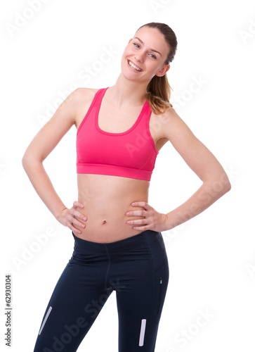 Woman in gym clothes smiling © mimagephotos