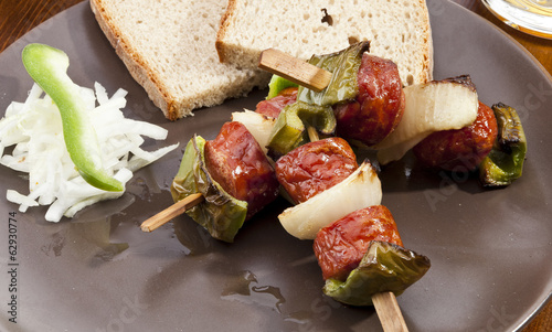 Grilled sausage on spit