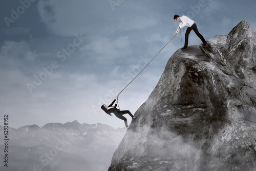 Billede på lærred Business help to overcome adversity