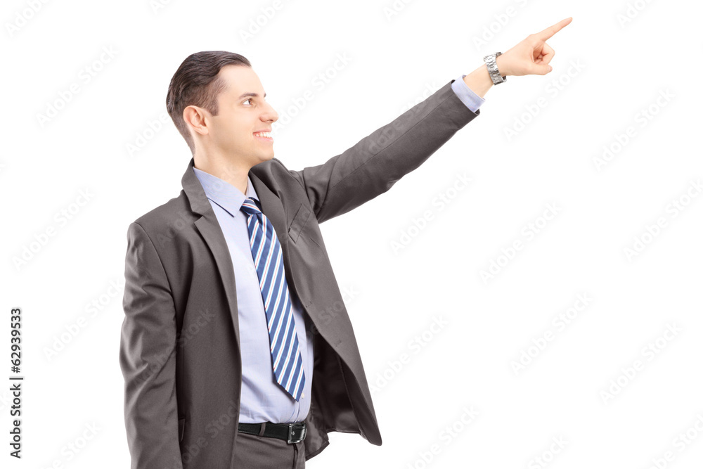 Businessman with briefcase pointing in a direction Businessman with briefcase pointing in a direction