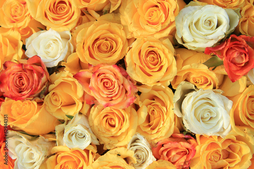 yellow and white rose wedding arrangement