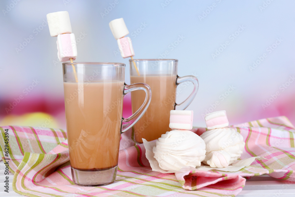 Hot chocolate with marshmallows, on light background Hot chocolate with marshmallows, on light background