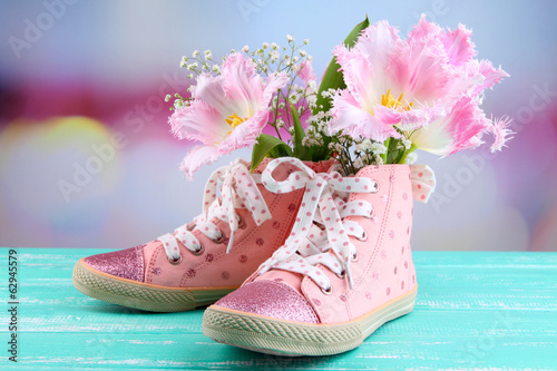 Beautiful gumshoes with flowers inside