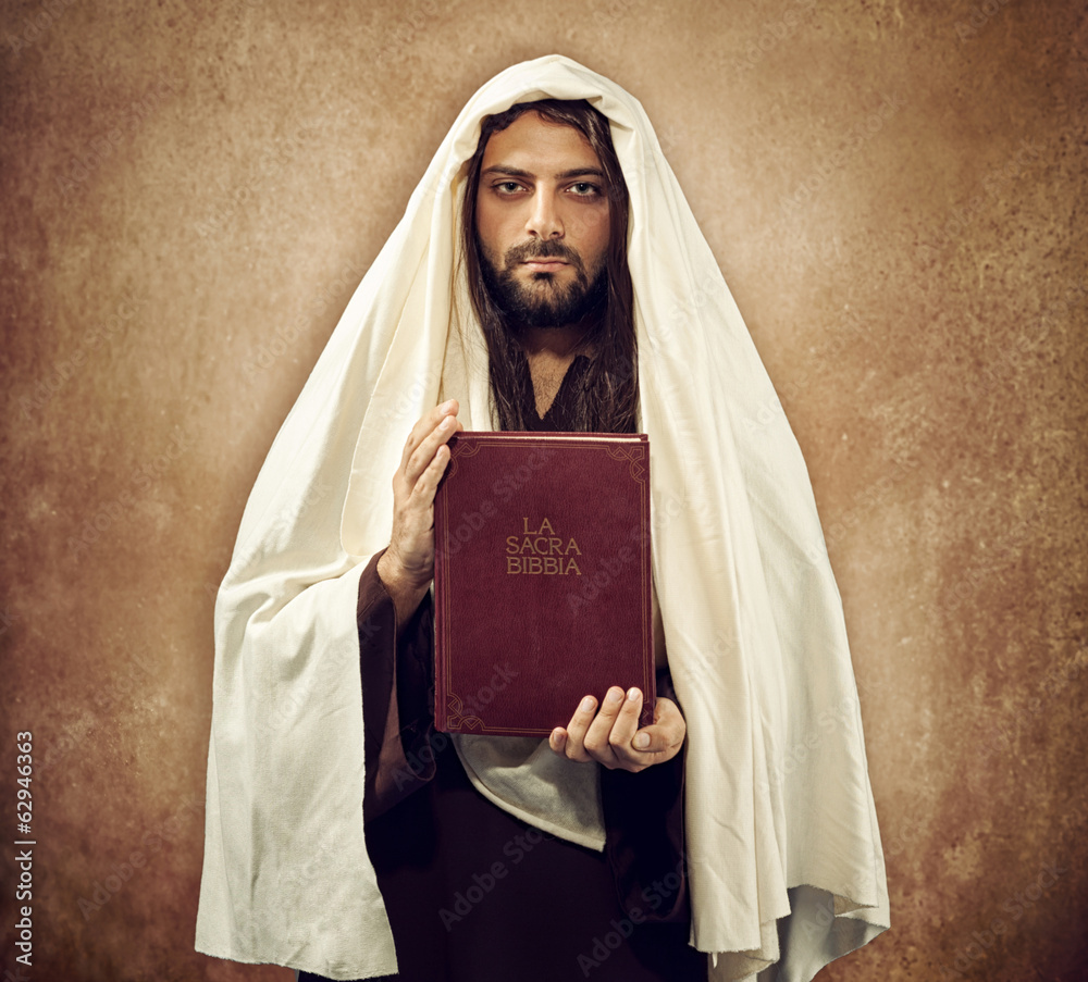 Jesus shows the holy bible Stock Photo Adobe Stock