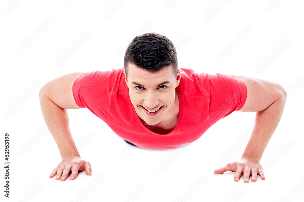 Young man doing push-ups Young man doing push-ups