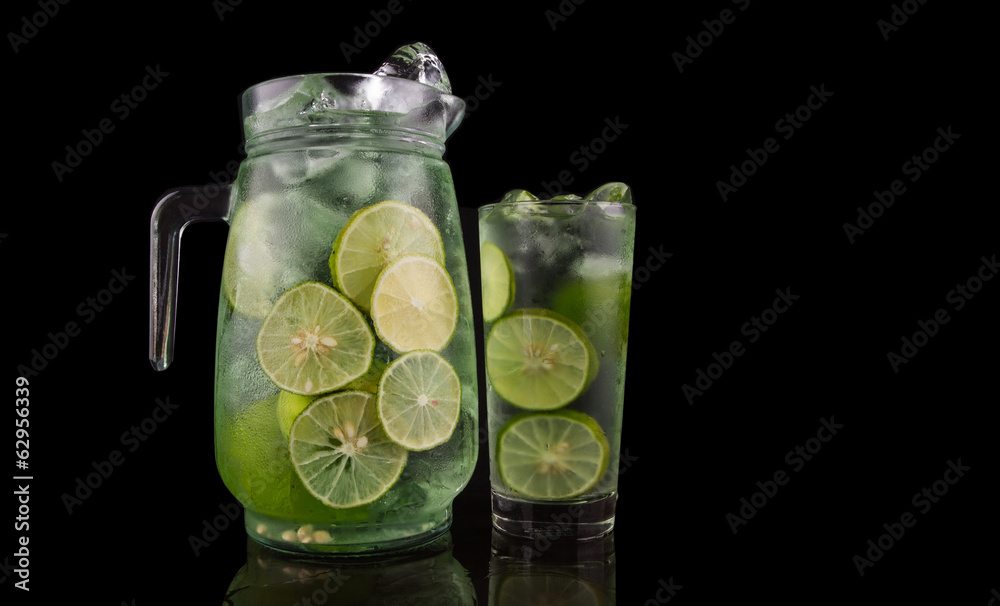 Lime juice over black background Lime juice over black background