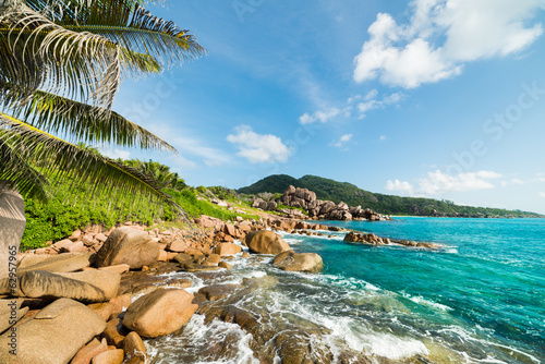 tropical turquoise sea with granite boulders © kubais