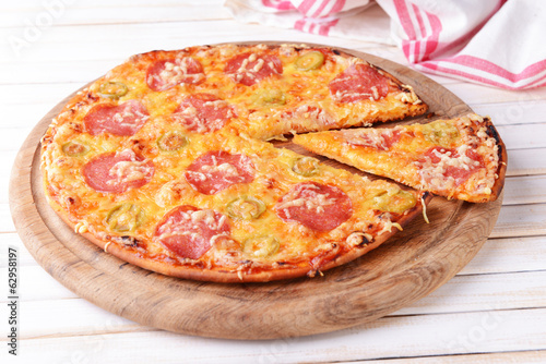 Tasty pizza on table close-up