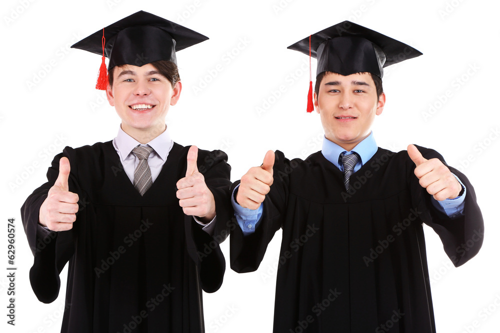 Two happy graduating students isolated on white Two happy graduating students isolated on white