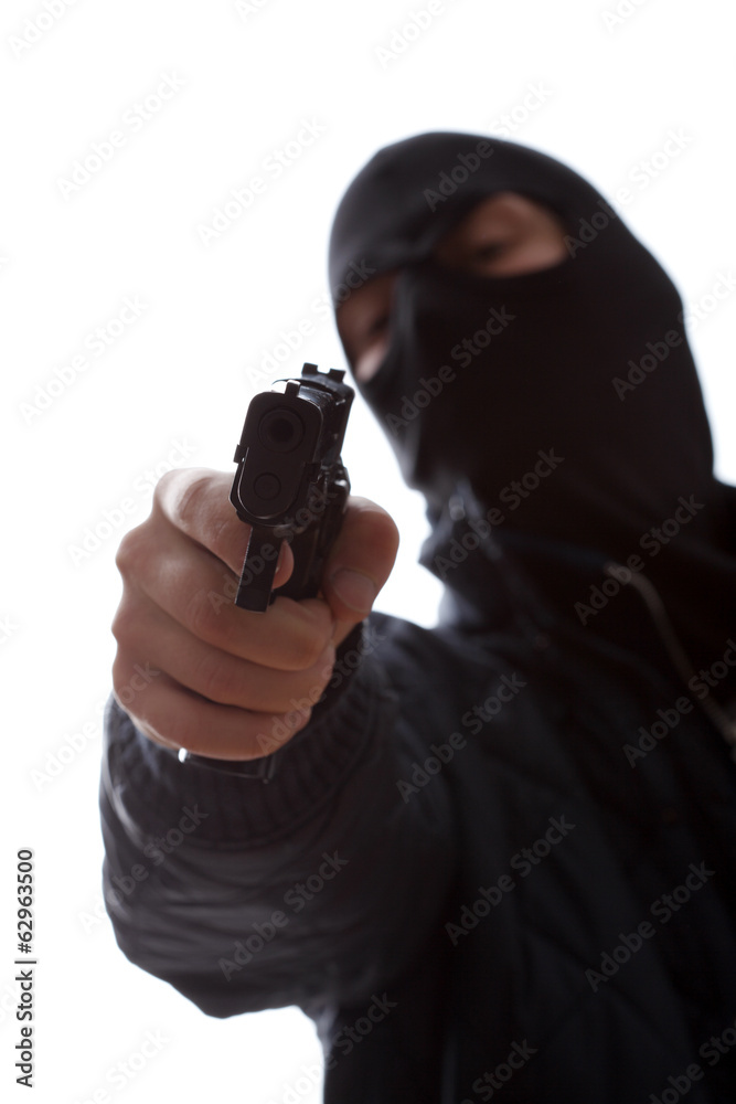 Murderer taking a target gun Murderer taking a target gun