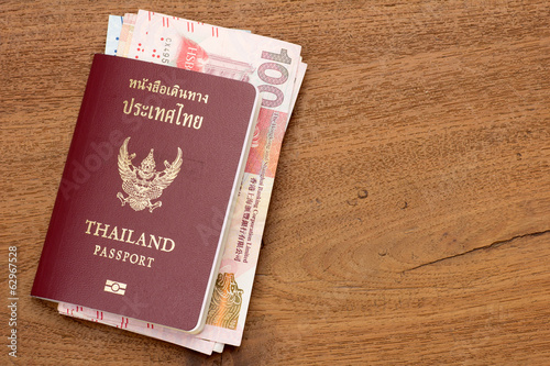 Photography Thailand passport with hongkong currency.