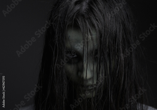 Zombie girl with horror expression