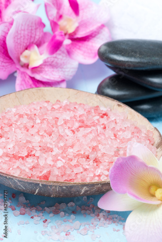 pink sea salt, stones for spa and flowers