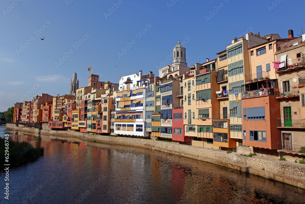 View of the old town with colorful houses reflected in water Jew