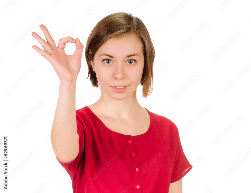 young woman shows sign and symbol on white background young woman shows sign and symbol on white background