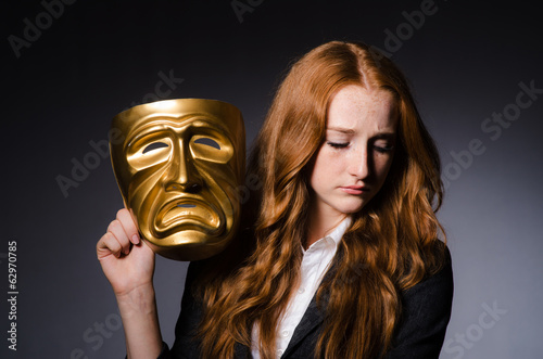 Quadro su tela Woman with mask in hypocrisy concept