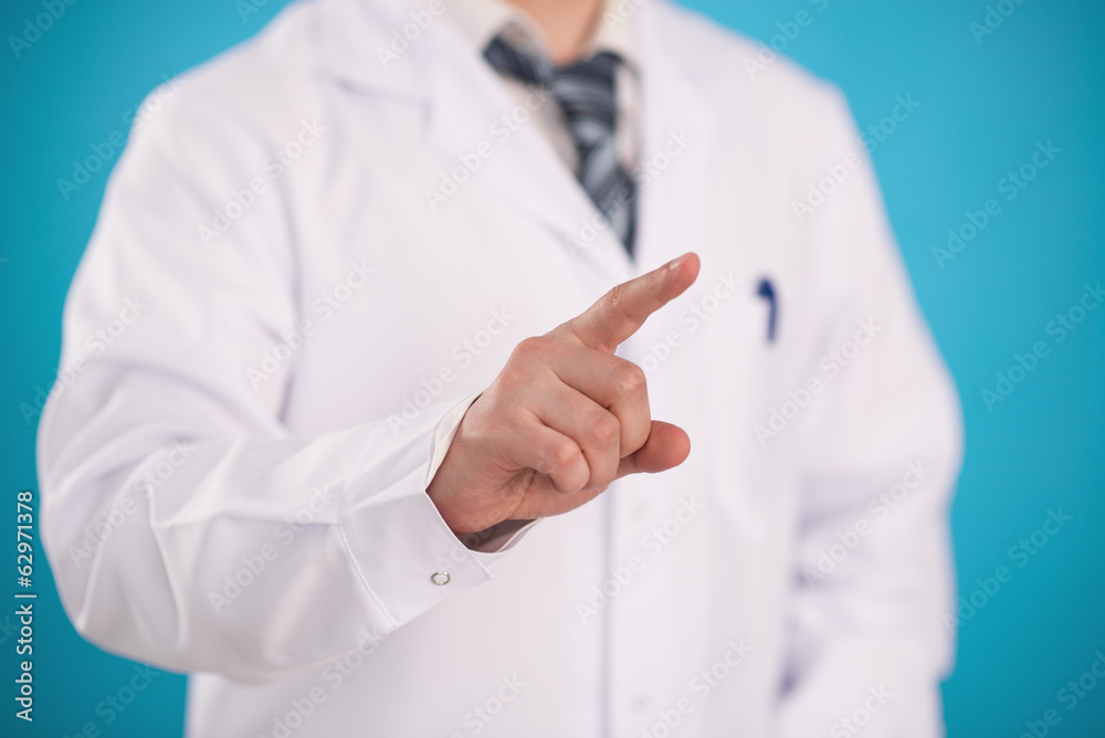 Close-up of doctor's finger pushing virtual button on monitor Close-up of doctor's finger pushing virtual button on monitor