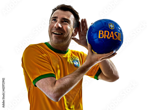 caucasian man brazilian brazil listening to soccer ball