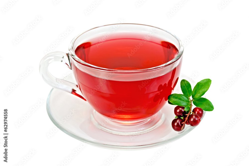 Tea with cranberries in a glass cup Tea with cranberries in a glass cup