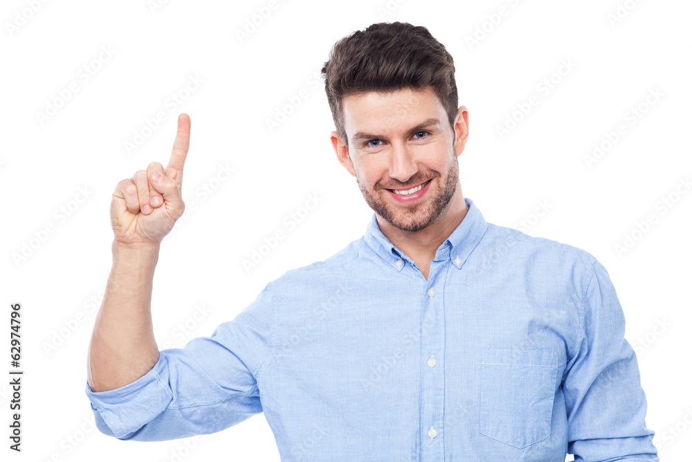 Young man pointing up Young man pointing up