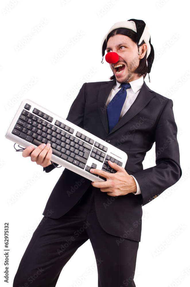 Funny clown with keyboard isolated on white Funny clown with keyboard isolated on white
